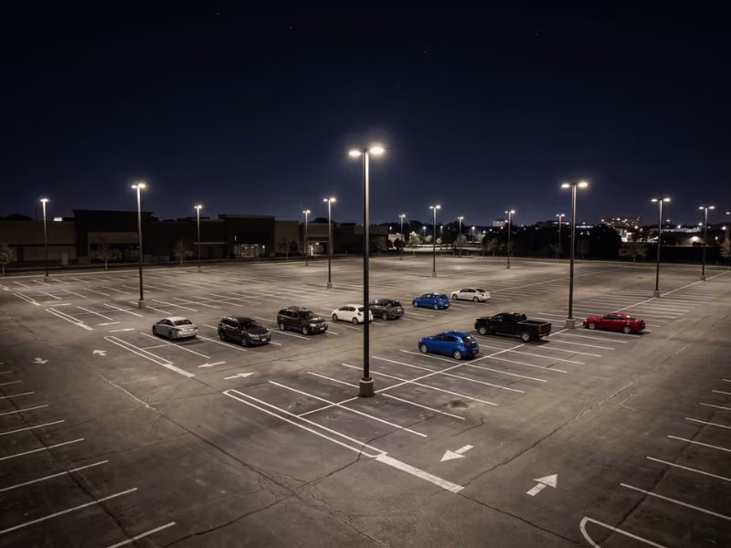 Parking lot at night lit by LED pole lights